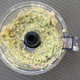 Aerial view of lemongrass marinade in food processor bowl